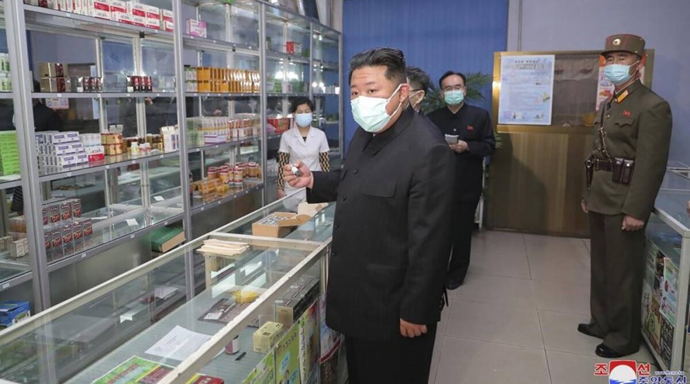 North Korean leader Kim Jong Un, center, visits a pharmacy in Pyongyang, North Korea Sunday, May 15, 2022. (AP)
