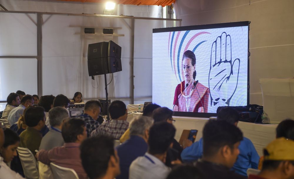 Udaipur: Media personnel listen to the virtual address of Congress interim President Sonia Gandhi during the party's 'Nav Sankalp Chintan Shivir', in Udaipur, Friday, May 13, 2022. (PTI Photo/Manvendar Vashist)