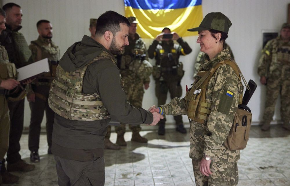 In this photo provided by the Ukrainian Presidential Press Office on Sunday, May 29, 2022, Ukrainian President Volodymyr Zelenskyy, left, awards a servicewoman as he visits the war-hit Kharkiv region. Volodymyr Zelenskyy described the situation in the east as "indescribably difficult." The "Russian army is trying to squeeze at least some result" by concentrating its attacks there, he said in a Saturday night video address. AP/PTI