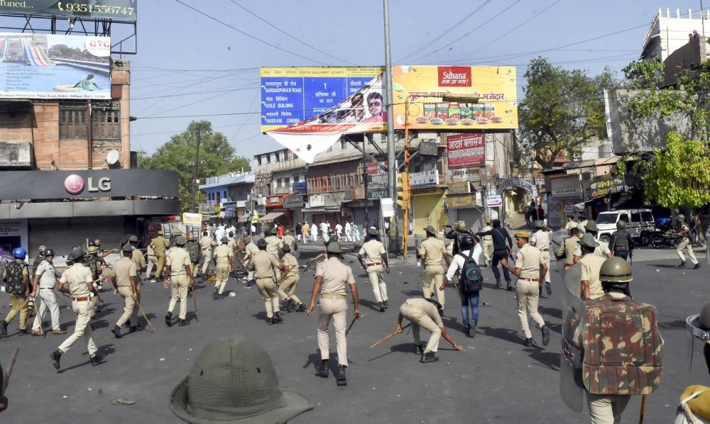 Jodhpur: Police resort to baton charge after clashes broke out between two communities on Eid-ul-Fitr, in Jalori Gate area, in Jodhpur, Tuesday, May 3, 2022. (PTI Photo)