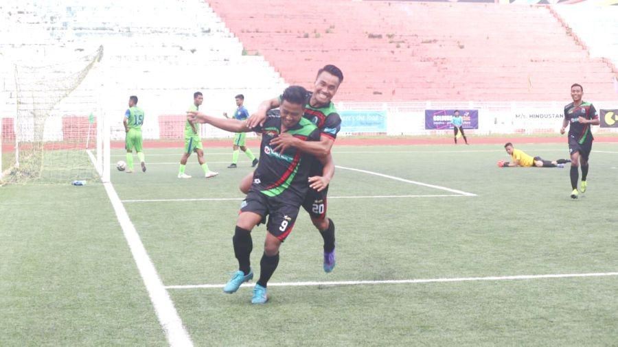 Yhunshalo Kemp celebrates after scoring a goal for G- Sports FC.