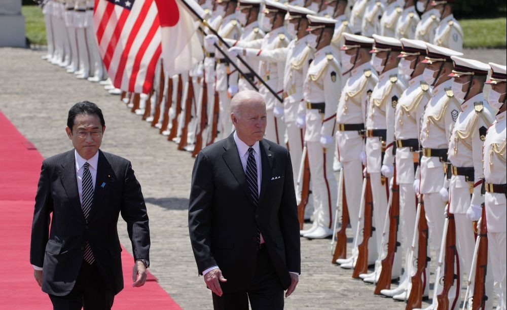 U.S. President Joe Biden, right, and Japan's Prime Minister Fumio Kishida, left, review an honor guard during a welcome ceremony for President Biden, at the Akasaka Palace state guest house in Tokyo, Japan, Monday, May 23, 2022. AP/PTI