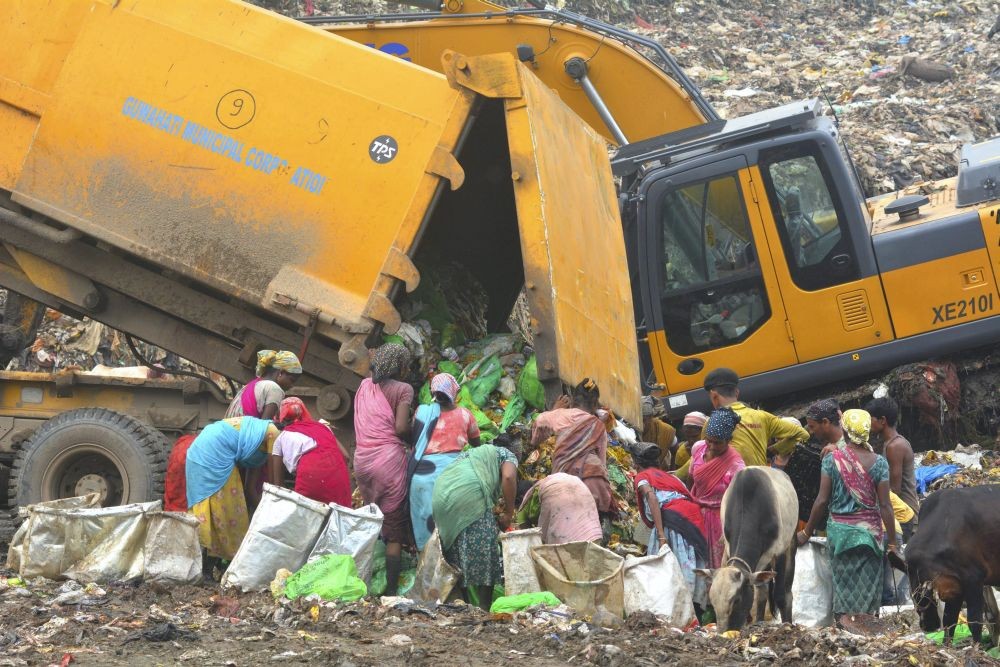 Guwahati: Rag pickers look for recyclable material at the Boragaon garbage dumping site, in Guwahati, Saturday, June 4, 2022, a day ahead of the ‘World Environment Day’. (PTI Photo)