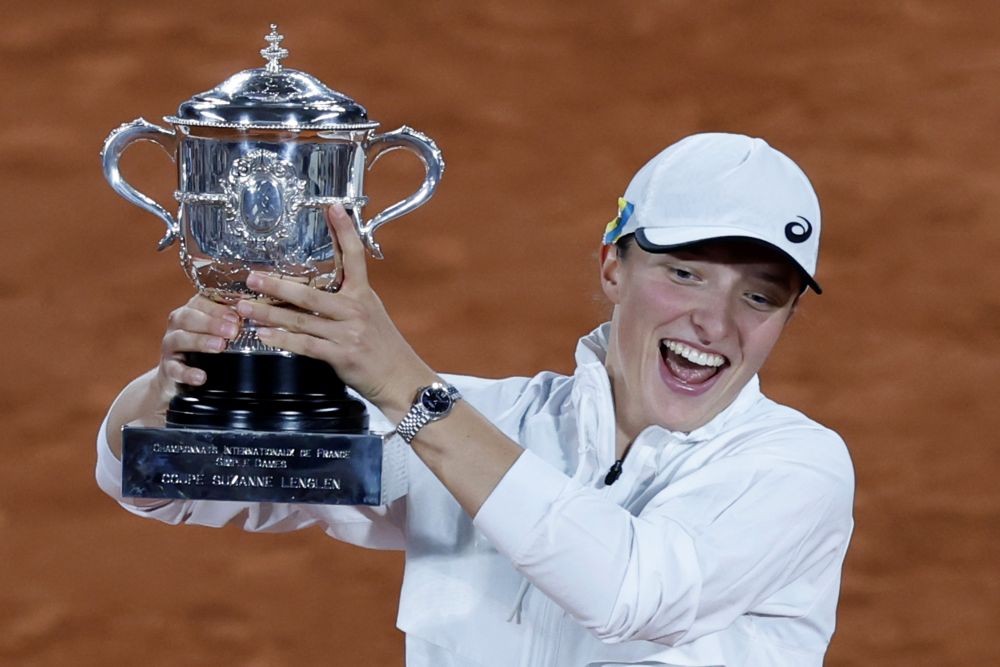 Poland's Iga Swiatek celebrates with the cup after defeating Coco Gauff of the U.S.in their final of the French Open tennis tournament at the Roland Garros stadium Saturday, June 4, 2022 in Paris. Swiatek won 6-1, 6-3. AP/PTI(