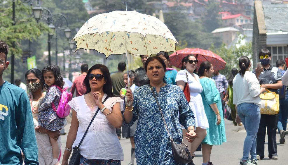 Shimla: People take a stroll at Mall road on a hot summer day, in Shimla, Saturday, June 11, 2022. (PTI Photo)