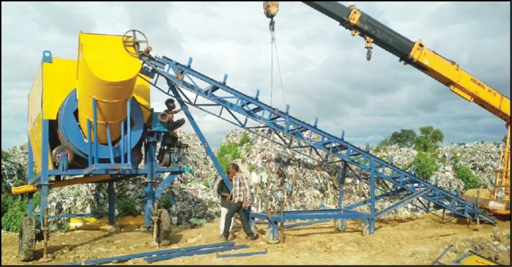 (LEFT) Biomining machine installed at the DMC Landfill at Burma Camp, Dimapur. The machine will segregate residual non-biodegradable waste from organic residue. (Photo Courtesy: DMC)
