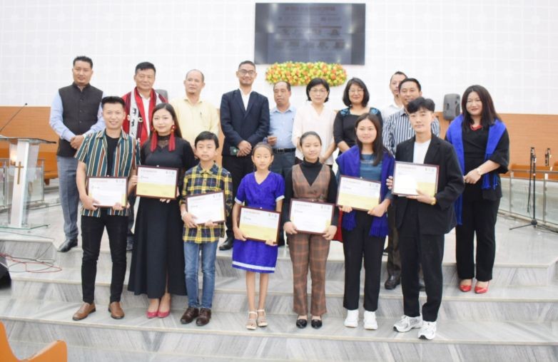 Winners of the spoken word poetry and solo competitions with others during the Clean Election Movement programme held at Yimyu Baptist Church, Mokokchung on June 10. (Morung Photo)