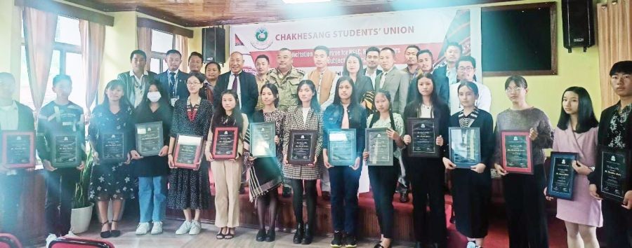 HSLC and HSSLC toppers with Vekhosa Kotso, CSU officials and others during felicitation programme in Kohima on June 18. (Morung Photo)