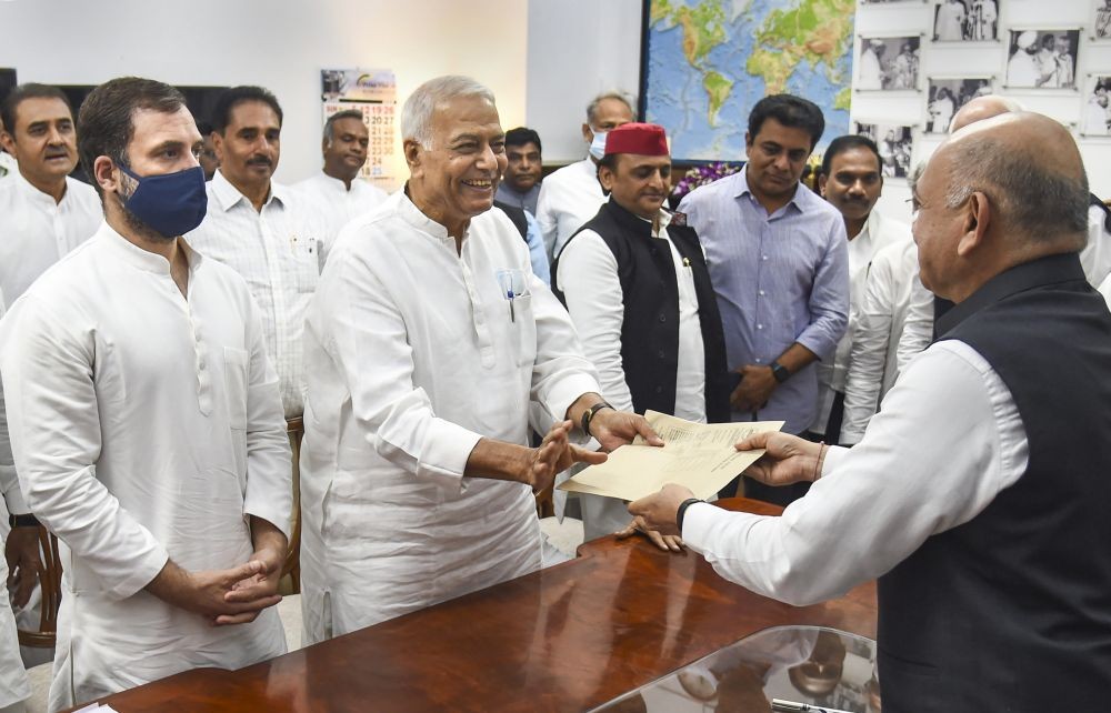 New Delhi: Opposition candidate Yashwant Sinha files his nomination papers for presidential election in the presence of Congress leader Rahul Gandhi, SP leader Akhilesh Yadav and other opposition leaders, at Parliament House in New Delhi, Monday, June 27, 2022. (PTI Photo/Shahbaz Khan)