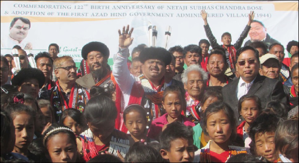 Suresh Chavhanke (in traditional attire) and others with the villagers during the adoption ceremony in Ruzazho village on January 23.