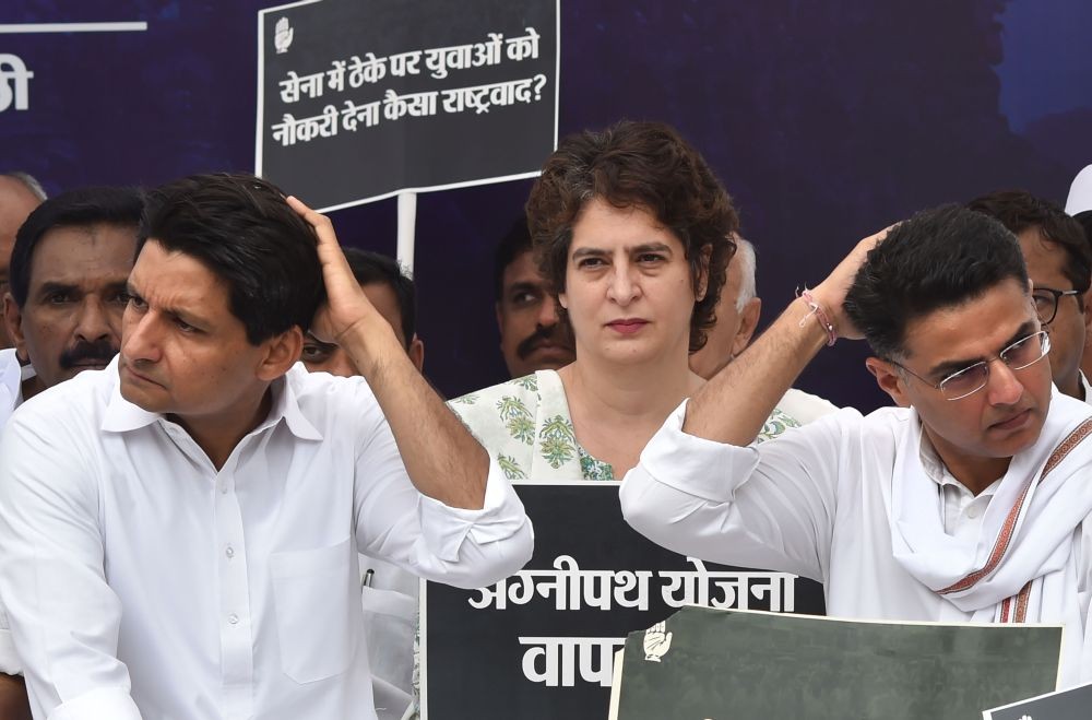 New Delhi: Congress leaders Priyanka Gandhi Vadra, Sachin Pilot and Deepender Singh Hooda during the Congress' 'Satyagraha' against the Central government's 'Agnipath' scheme, at Jantar Mantar in New Delhi, Sunday, June 19, 2022. (PTI Photo/Manvender Vashist)