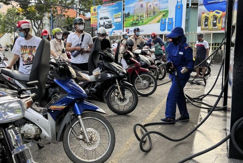 People wait for gas pump in Hanoi, Vietnam on June 19, 2022. Across the globe, drivers are rethinking their habits and personal finances amid skyrocketing prices for gasoline and diesel, fueled by Russia's war in Ukraine and the global rebound from the COVID-19 pandemic. Energy prices are a key driver of inflation that is rising worldwide and making the cost of living more expensive. (AP Photo)