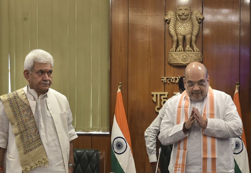 New Delhi: Union Home Minister Amit Shah with J & K Lt Governor Manoj Sinha holds a review meeting on security/law & order situation in Jammu and Kashmir, in New Delhi, Friday, June 3, 2022. (PTI Photo/Arun Sharma)