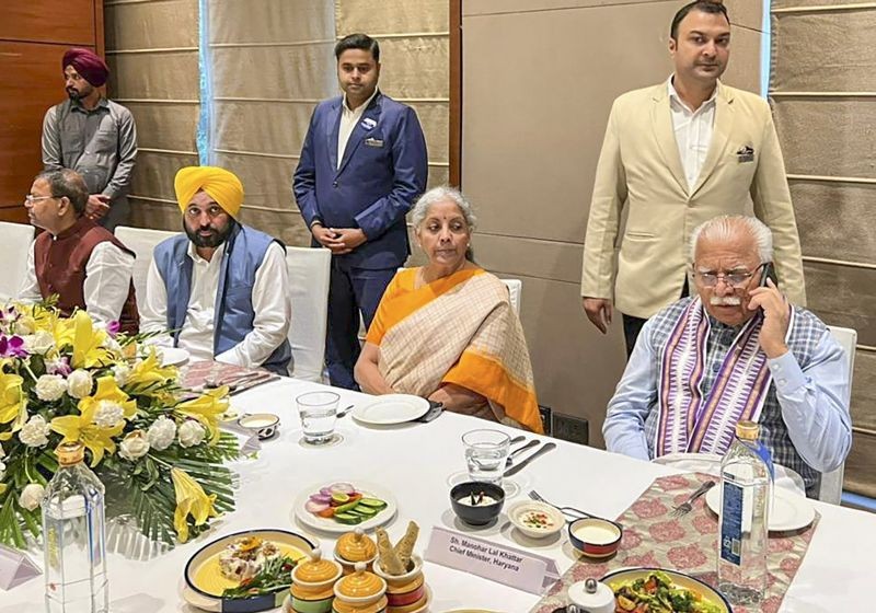 Union Finance Minister Nirmala Sitharaman with Punjab Chief Minister Bhagwant Mann during a lunch hosted by him in honour of all the delegates attending 47th Goods and Services Tax (GST) Council Meeting, in Chandigarh. Haryana CM Manohar Lal Khattar is also seen. (PTI Photo)