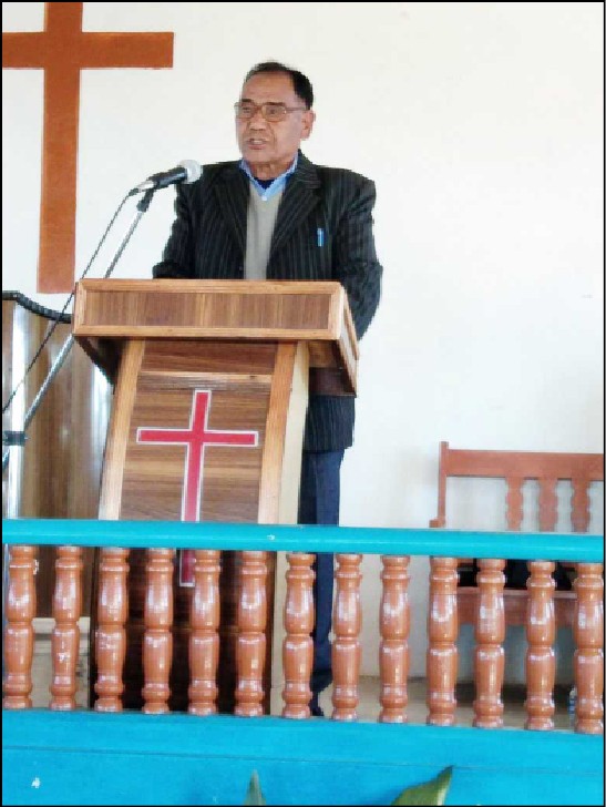 Rev. Dohekhu Achumi delivering message during the farewell programme cum thanksgiving service held on January 13. (Photo Courtesy/ AVBC)