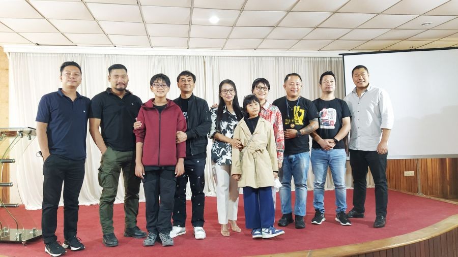Kenei Kuotsu & his family with MonAram Brand Ambassador, Thejakielie Zuyie and Dreamz Unlimited. (Morung Photo)