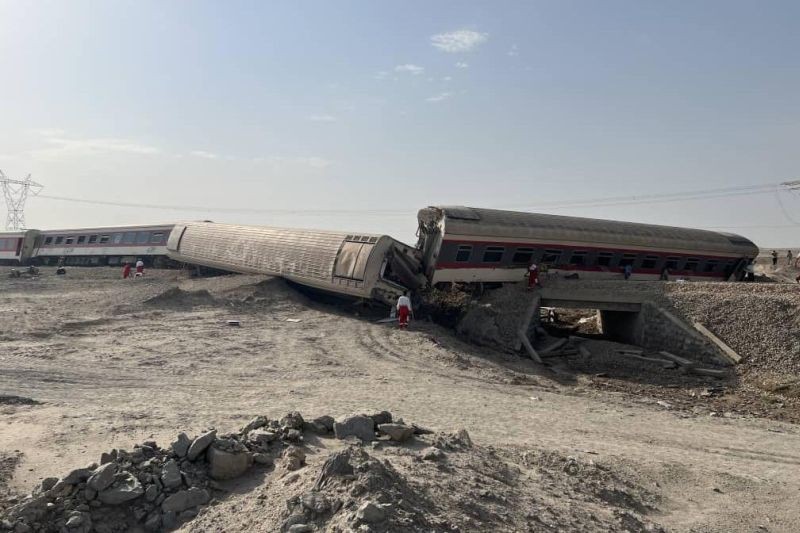 This photo provided by the Iranian Red Crescent Society shows the scene where a passenger train partially was derailed near the desert city of Tabas in eastern Iran on June 8, 2022. (AP Photo)