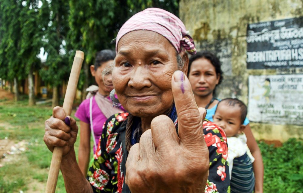 Damchara: A Reang tribal woman shows her finger marked with indelible ink after casting vote during Assembly by-polls, at Aanndabazar in North Tripura district, Thursday, June 23, 2022. (PTI Photo)