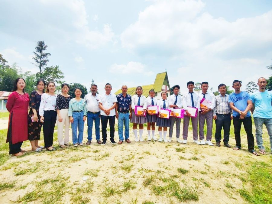 Staff and students of GHS Saring village, under Longchem HQ. The school has achieved 100 percent result in HSLC examination for the fourth year straight.
