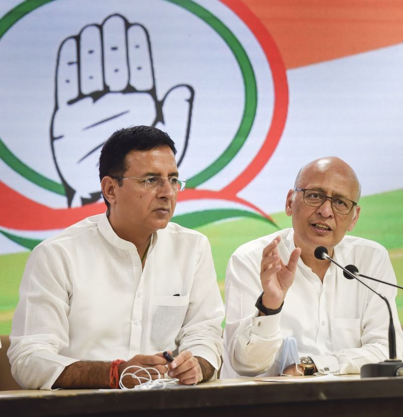 Congress leaders Randeep S. Surjewala and Abhishek M. Singhvi address a press conference at party headquarters, in New Delhi on June 1, 2022. (PTI Photo)