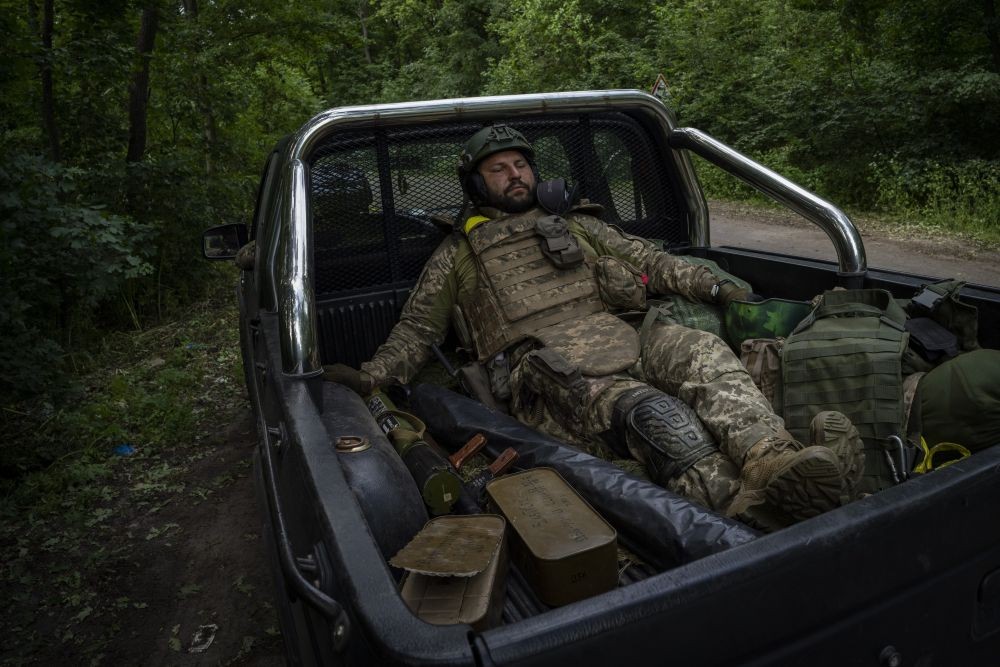 A Ukrainian serviceman pauses before going back to the frontline in the Donetsk oblast region, eastern Ukraine, Sunday, June 5, 2022. AP/PTI