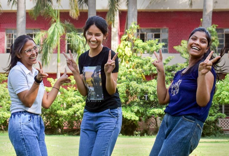 Students celebrate their success after Haryana Board of School Education (HBSE) class XIIth exam results were declared, at Jeevan Jyoti School in Gurugram on June 15, 2022. (PTI Photo)