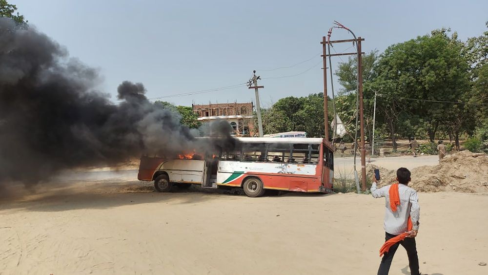 Jaunpur: A bus that was set ablaze by Anti-Agnipath protestors, in Jaunpur, Saturday, June 18, 2022. (PTI Photo)