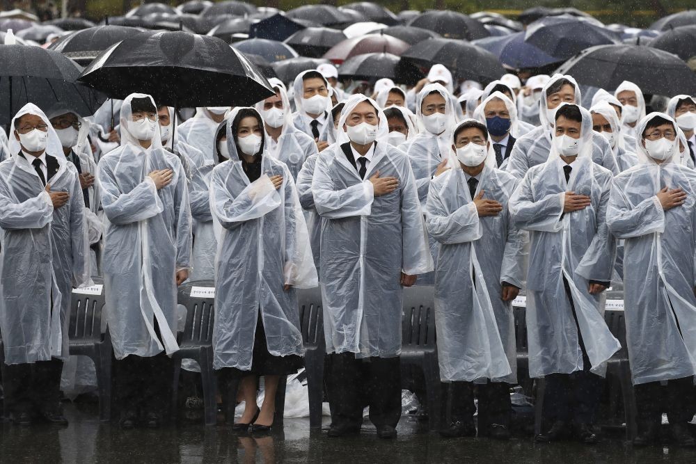 South Korean President Yoon Suk Yeol, center right,  and his wife Kim Keon Hee, center left, attend a ceremony marking the country‚Äôs Memorial Day at the Seoul National Cemetery in Seoul, South Korea Monday,  June 6, 2022. AP/PTI