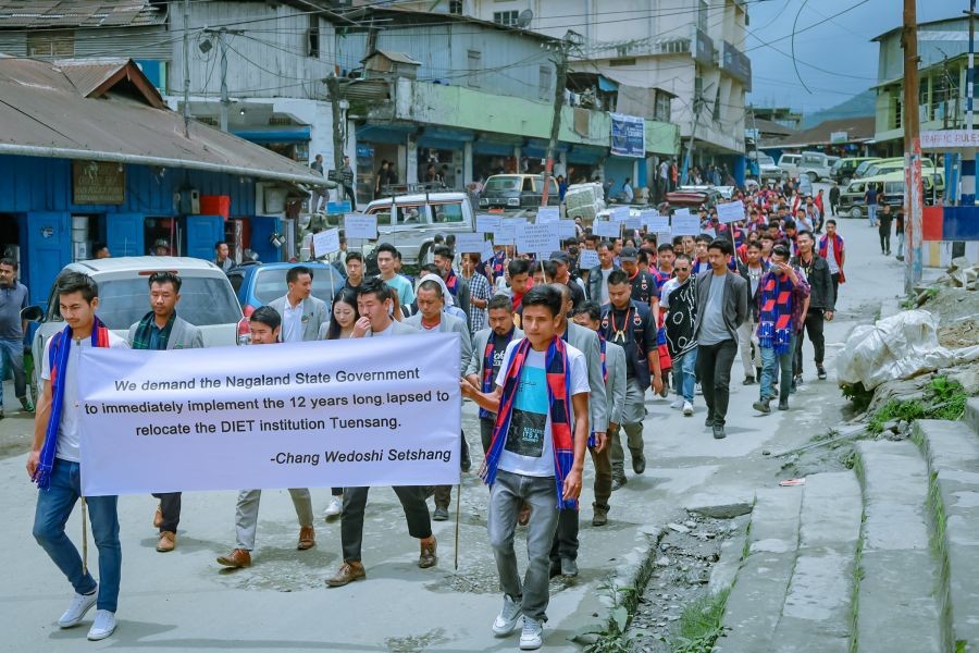 Participants displaying placards during the programme organised by the CWS at Clock Tower, Tuensang town on June 20. (Morung Photo)