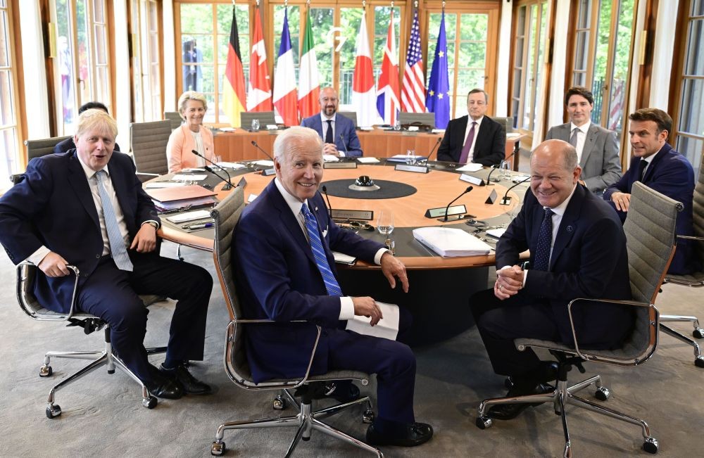 Clockwise from left, Fumio Kishida (covered), Prime Minister of Japan, Ursula von der Leyen, President of the European Commission, Charles Michel, President of the European Council, Mario Draghi, Prime Minister of Italy, Justin Trudeau, Prime Minister of Canada, Emmanuel Macron, Prime Minister of France, German Chancellor Olaf Scholz, US President Joe Biden and Boris Johnson, Prime Minister of the United Kingdom sit at the first working session in Castle Elmau in Kruen, near Garmisch-Partenkirchen, Germany, on Sunday, June 26, 2022. The Group of Seven leading economic powers are meeting in Germany for their annual gathering Sunday through Tuesday. AP/PTI