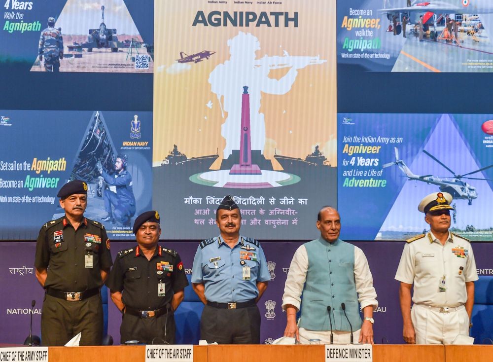 New Delhi: Union Defence Minister Rajnath Singh with three services' chiefs General Manoj Pande (Army), Air Chief Marshal VR Chaudhari and Admiral R Hari Kumar (Navy) during a press conference at National Media Center, in New Delhi, Tuesday, June 14, 2022. (PTI Photo/Manvender Vashist)(