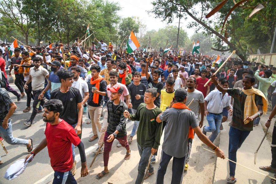 Danapur: Protester block the Khagaul Road during a protest against the 'Agnipath' scheme near Patna, Friday, June 17, 2022. (PTI Photo)