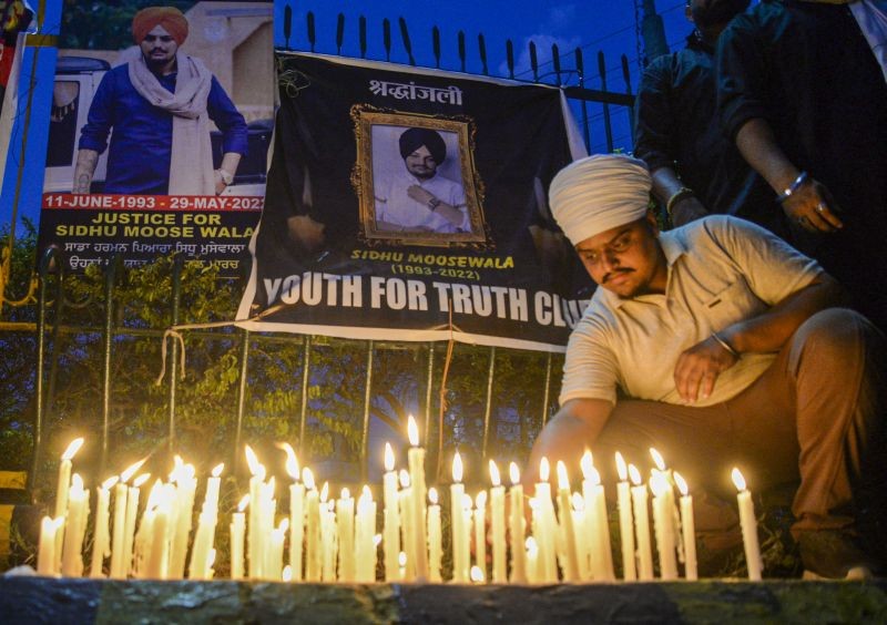 Youngsters during a candlelight march to pay tribute to Punjabi singer late Sidhu Moosewala, in Jalandhar, Friday, June 3, 2022. (PTI Photo)