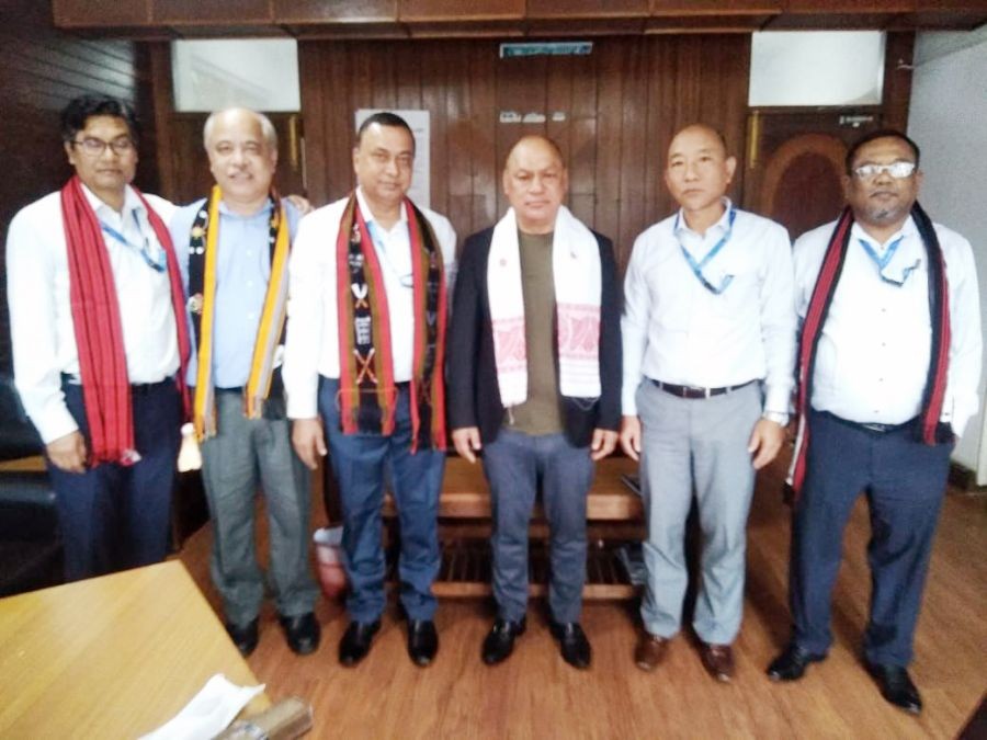 OIL officials with Minister Kashiho with others.