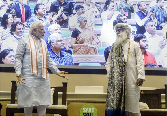 Prime Minister Narendra Modi with Sadhguru attends a programme on 'Save Soil Movement', on the occasion of World Environment Day, at Vigyan Bhawan in New Delhi on June 5. (PTI Photo)