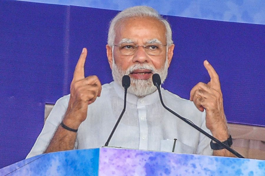 Navsari: Prime Minister Narendra Modi addresses the inauguration and foundation stone laying ceremony of multiple development projects, during the ‘Gujarat Gaurav Abhiyan’, in Navsari, Friday, June 10, 2022. (PTI Photo)(