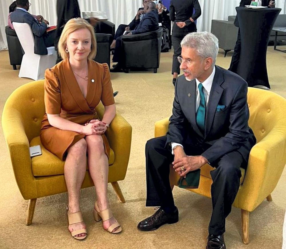 **EDS: TWITTER IMAGE POSTED BY @DrSJaishankar ON FRIDAY, JUNE 24, 2022** Kigali: External Affairs Minister S. Jaishankar with Foreign Secretary of UK Elizabeth Truss, during his visit to Rwanda to attend the 26th Commonwealth Heads of Government Meeting (CHOGM), in Kigali, Rwanda. (PTI Photo)