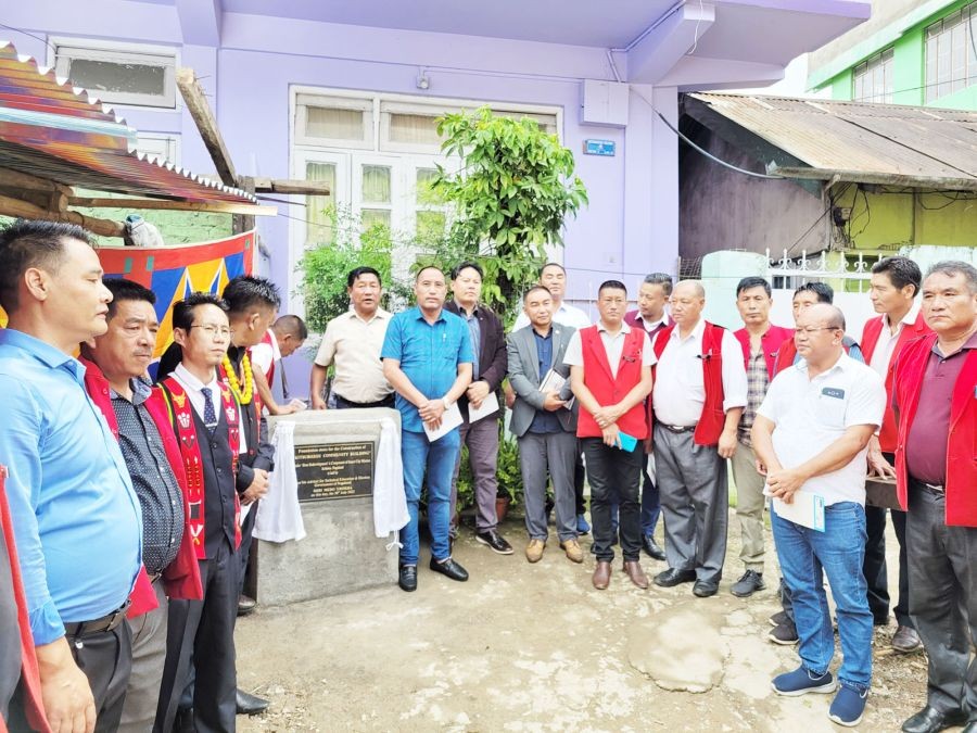 Medo Yhokha and others after laying the foundation stone for construction of Kitsubozou Community Hall on July 30. (Morung Photo)