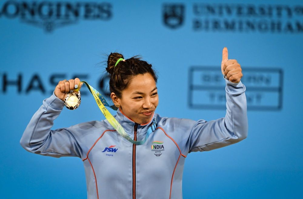 Birmingham: India's Mirabai Chanu with the gold medal after winning women's 49kg weightlifting category match of the Commonwealth Games 2022 (CWG), in Birmingham, UK, Saturday, July 30, 2022. (PTI Photo/Swapan Mahapatra)(
