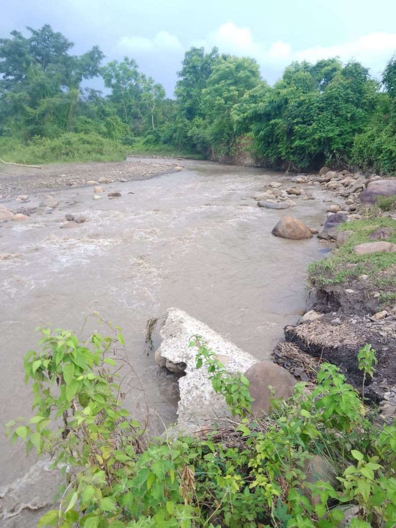 The irrigation dam which was damaged by flash flood in New Jalukie village on July 26.