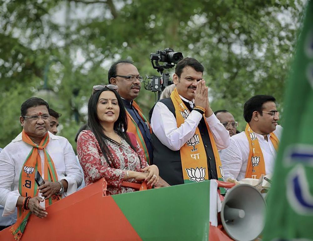 **EDS: TWITTER IMAGE POSTED BY @Devendra_Office ON TUESDAY, JULY 5, 2022** Nagpur: Maharashtra Deputy Chief Minister Devendra Fadnavis greets supporters during his first visit to his home-town after taking oath of office, in Nagpur. (PTI Photo)
