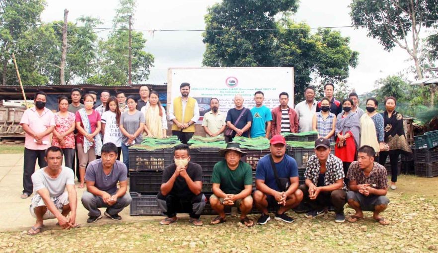 DC Mokokchung Shashank Pratap Singh along with DFO Mokokchung, Dr Sentitula and beneficiaries during the distribution of broiler chicks under livelihood Project an initiative of DPDB Mokokchung on July 18. (Morung Photo)