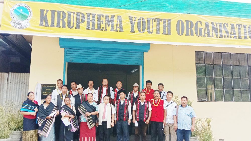 Rovilato Mor with KYO officials and village leaders on July 23.