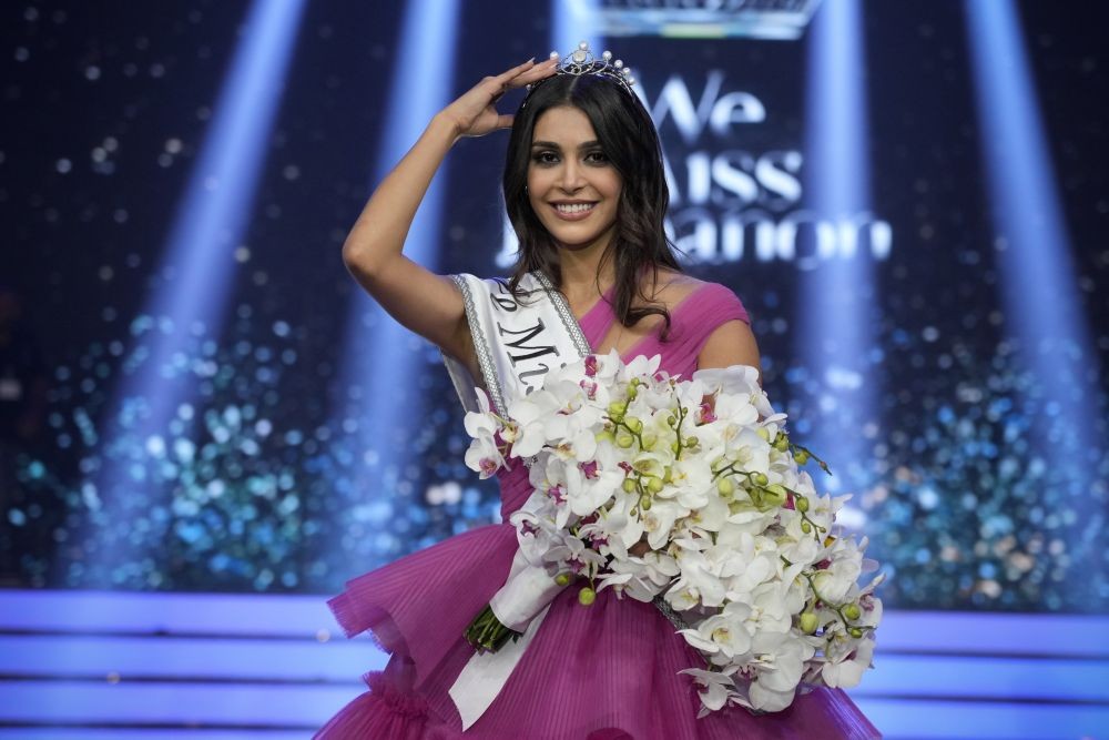 Newly-crowned Miss Lebanon Yasmina Zaitoun fixes her crown after winning the title in Beirut, Lebanon, late Sunday, July 24, 2022. The beauty pageant was held in Beirut after a three year hiatus after it was canceled due to the country's economic crisis and the coronavirus pandemic. AP/PTI(