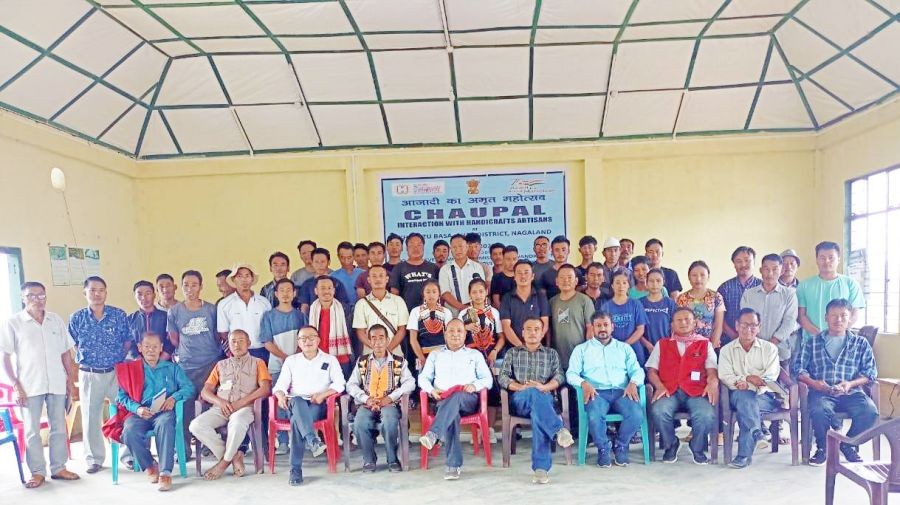 Officials and participants during an interaction programme with handicraft artisans at Khulazu Basa village on July 29.