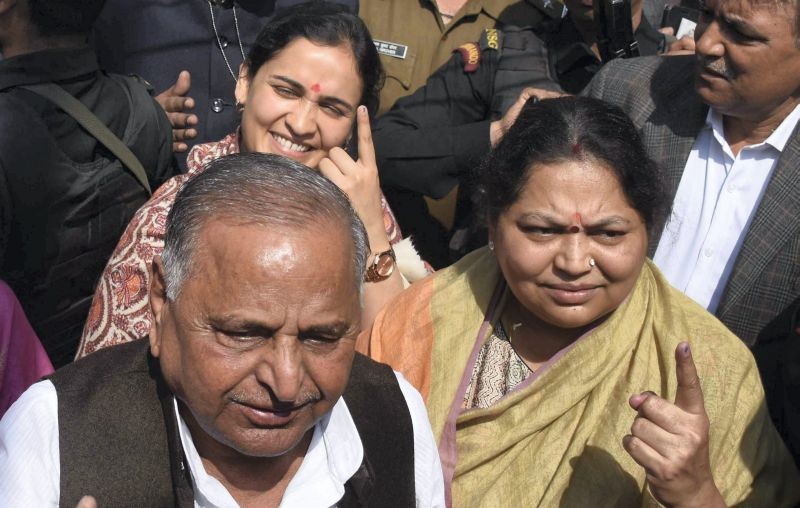 In this Sunday, Feb. 19, 2017 file photo, Samajwadi Party patron Mulayam Singh Yadav with his wife Sadhna Yadav (right), daughter-in-law and SP candidate Aparna Yadav (behind) after casting vote during the 3rd phase of UP Assembly elections in Saifai, Etawah. Sadhna passed away on Saturday, July 9, 2022. (PTI File Photo)(PTI07_09_2022_000217B)