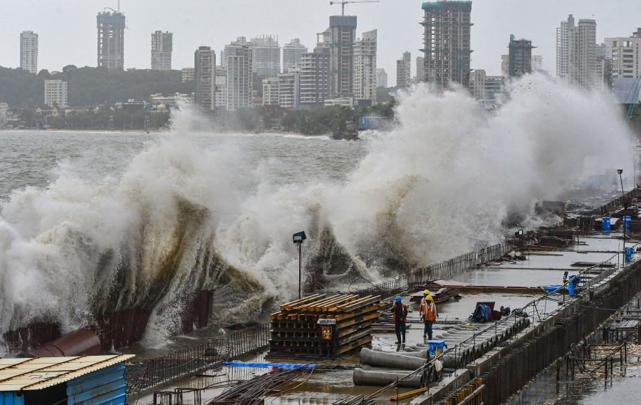 Mumbai: High tides crash at the Marine Drive sea front next to the site of a coastal road construction, in Mumbai, Saturday, July 16, 2022. (PTI Photo)