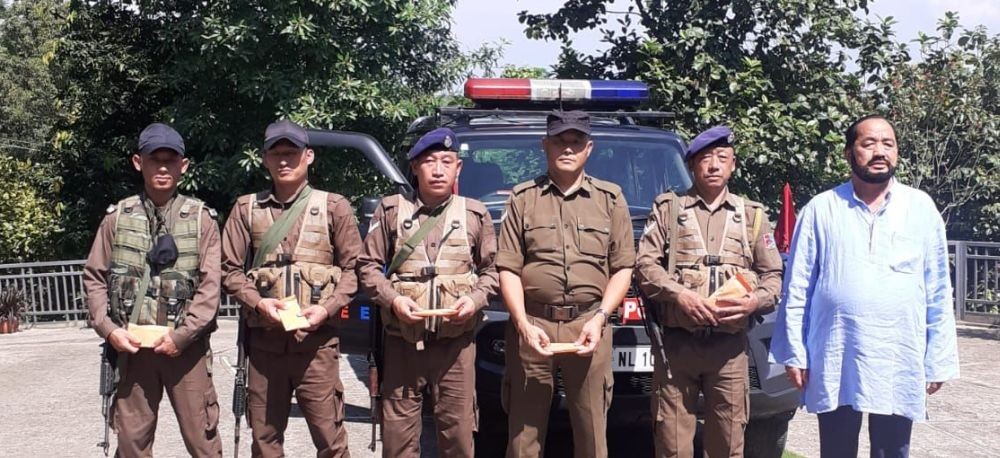 Dy CM and Minister incharge for Home, Y Patton with the five Nagaland Police Escort personnel on July 5. (DIPR Photo)