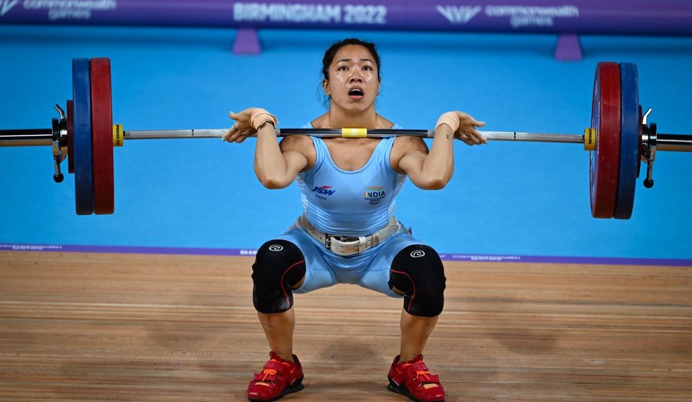 Birmingham: India's Mirabai Chanu in action during the women's 49kg weightlifting category match of the Commonwealth Games 2022 (CWG), in Birmingham, UK, Saturday, July 30, 2022. Chanu won the gold medal. (PTI Photo/Swapan Mahapatra)