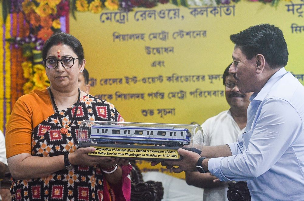 Howrah: Union Minister for Women and Child Development Smriti Irani receives a memento from General Manager of Kolkata Metro Railways Arun Arora during a ceremony for the inauguration of Sealdah Metro station and extension of East-West Metro metro service from Phoolbagan to Sealdah, at Howrah Maidan Metro station in Kolkata, Monday, July 11, 2022. (PTI Photo/Swapan Mahapatra)(